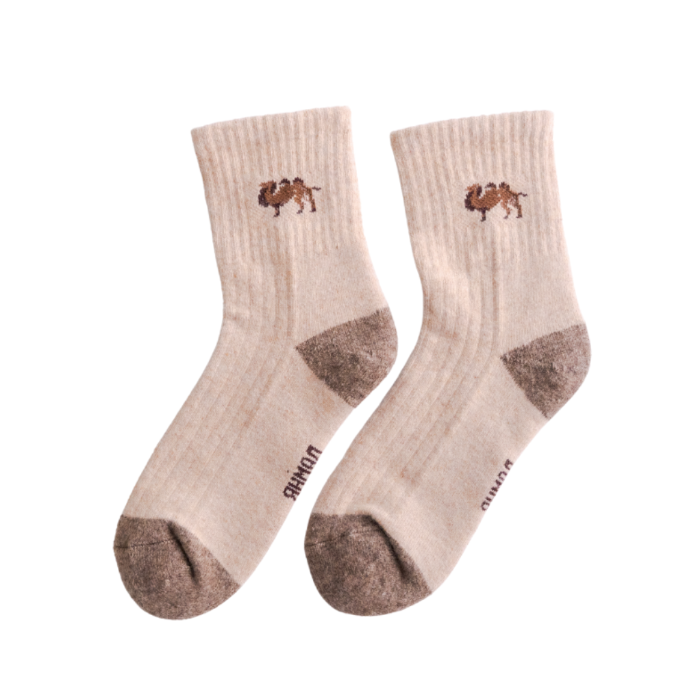 Pair of beige socks with camel design and 'Bacca Bucci' branding on a white background