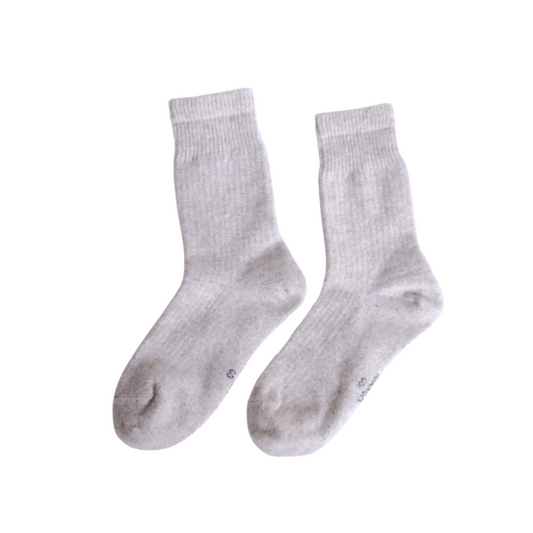 Pair of gray socks on a white background